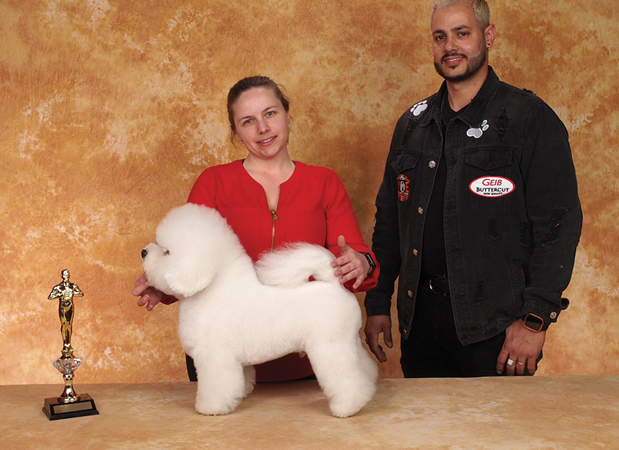 Rebecca Bradford with a white dog and the Electric Cleaner Company