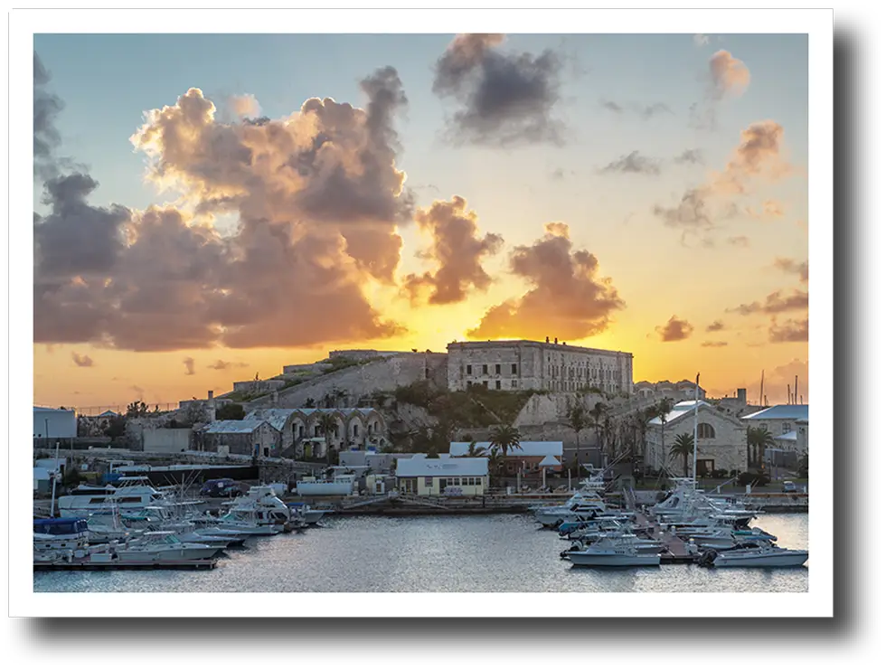 Bermuda coast at sunset with building and homes