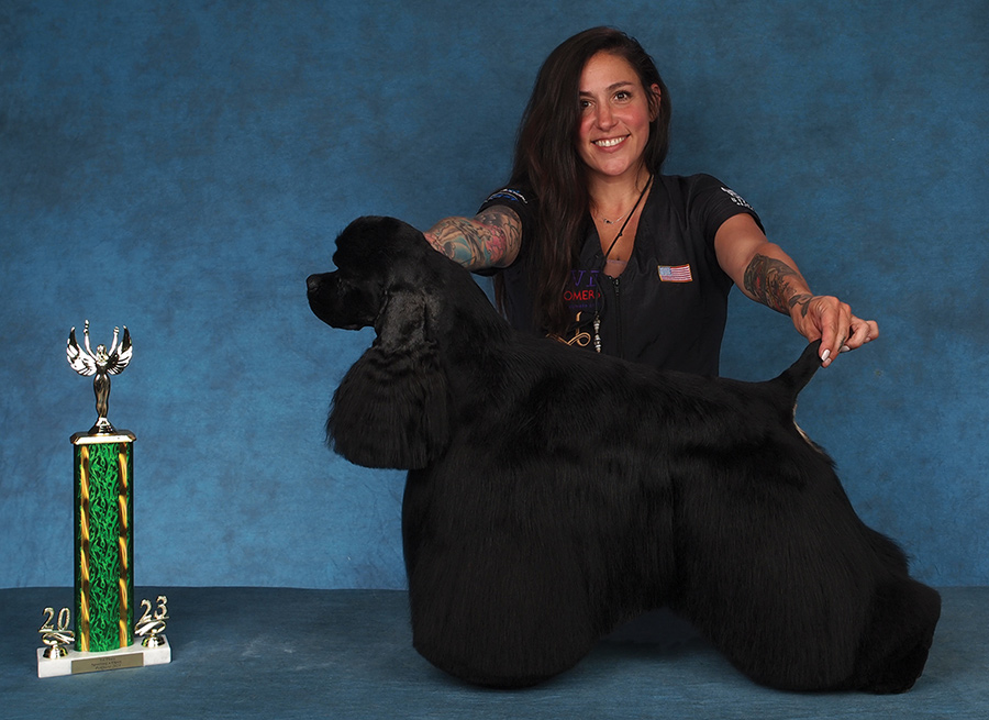 Mackensie Murphy and her black dog