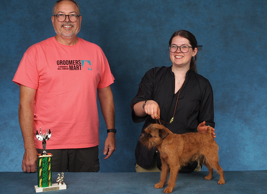 Emily James and her Brown dog with her sponsor