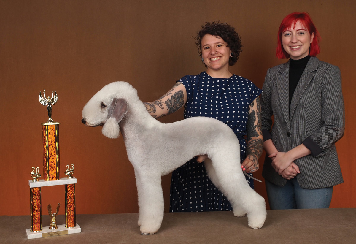 Nadia Bongelli with a dog and a trophy for Best in Show