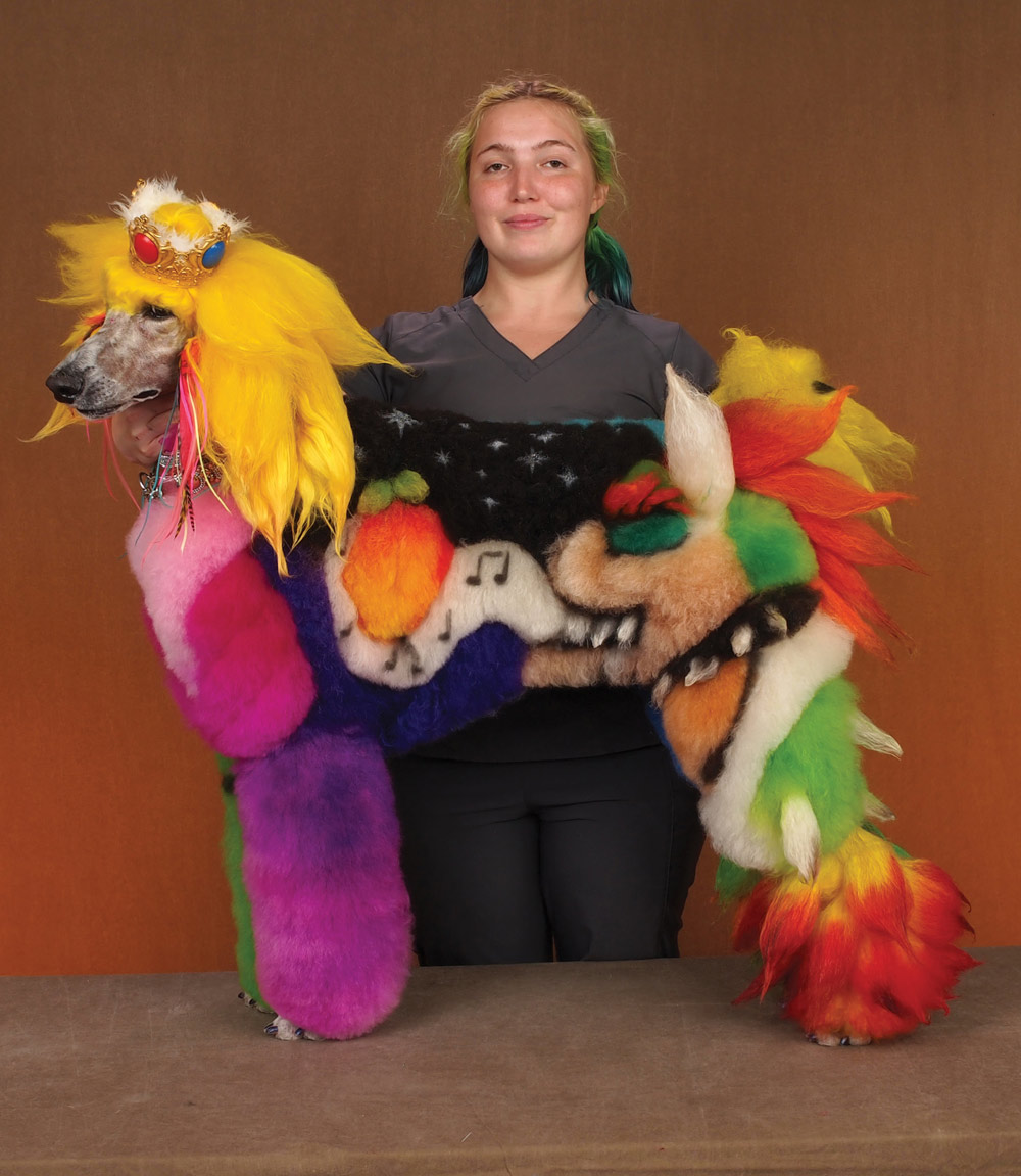 Blaze Schoen with a colorful dog