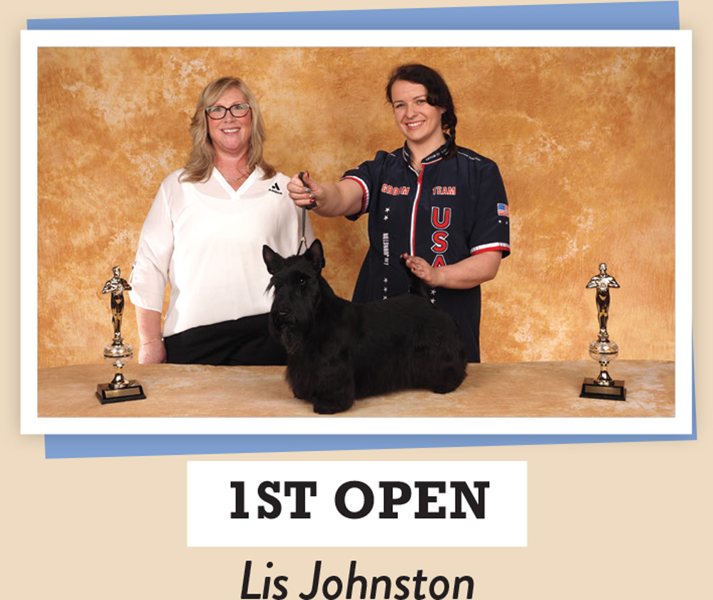 Lis Johnston posing with a dog and a trophy