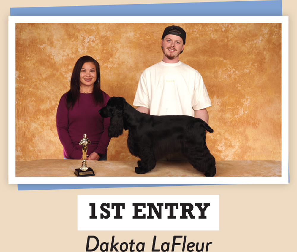 Dakota LaFleur posing with a dog and a trophy