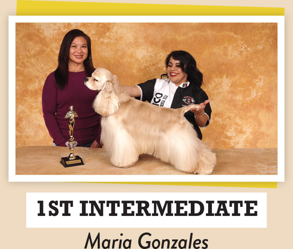 Maria Gonzales posing with a dog and a trophy