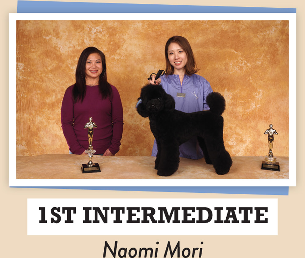 Naomi Mori posing with a dog and a trophy