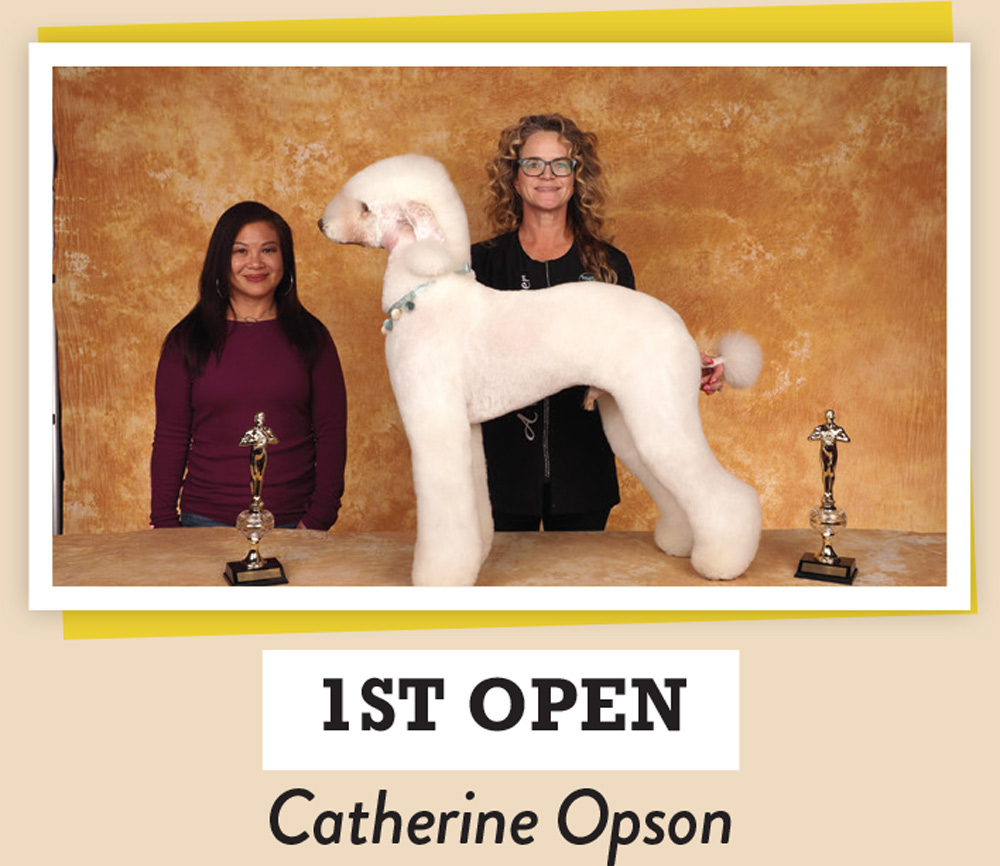 Catherine Opson posing with a dog and a trophy