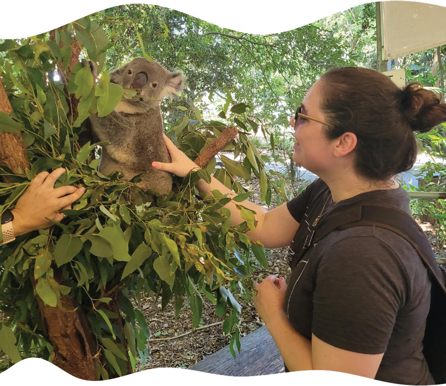 woman petting koala