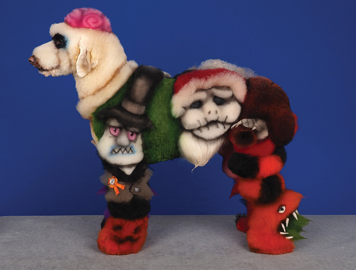 Profile of a poodle creatively dyed and sculpted with characters from The Nightmare Before Christmas, including Jack Skellington and the Mayor.